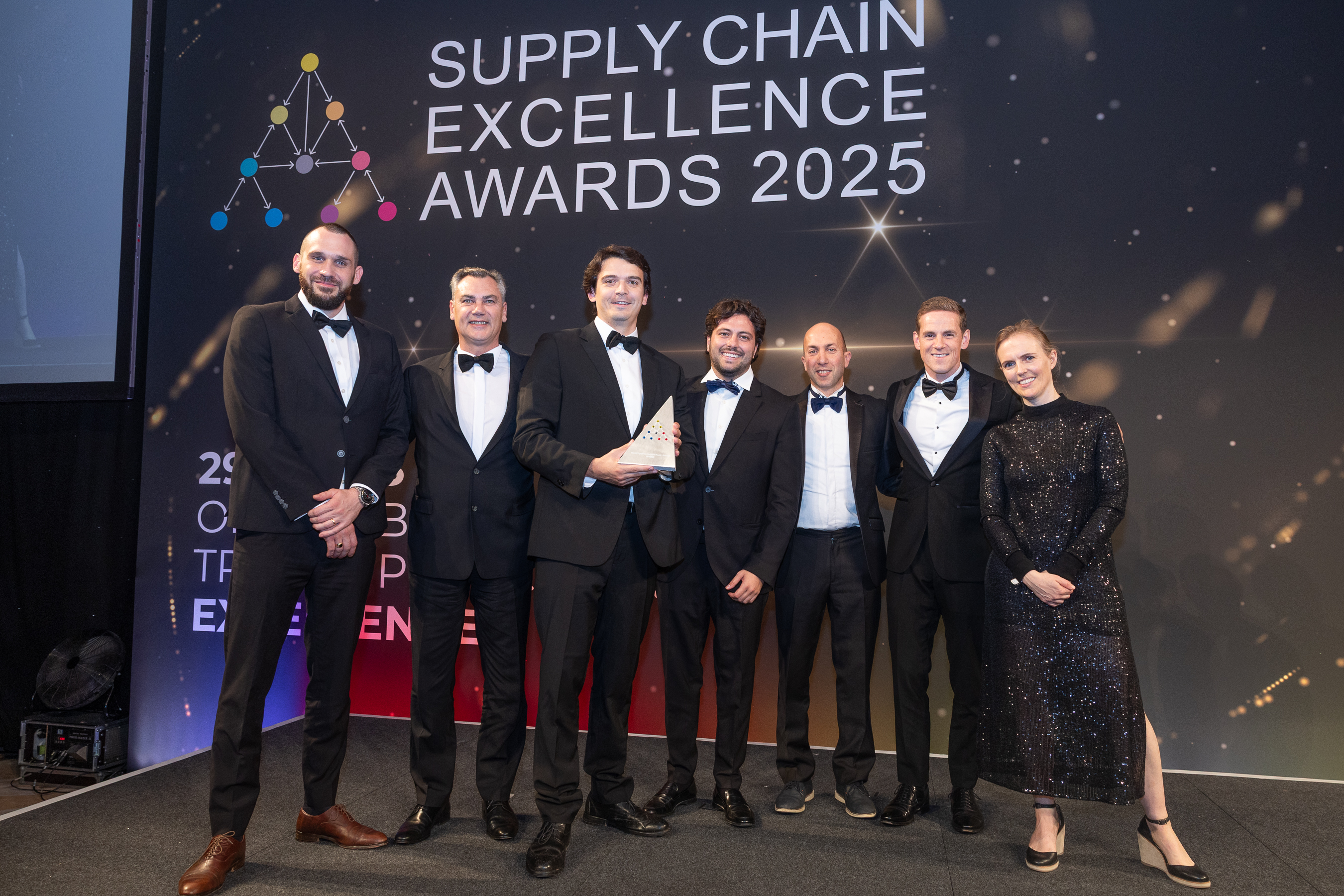 CRYOPDP and Applied Blockchain team members on stage receiving the SAP Digital Transformation Award at the 2025 Supply Chain Excellence Awards