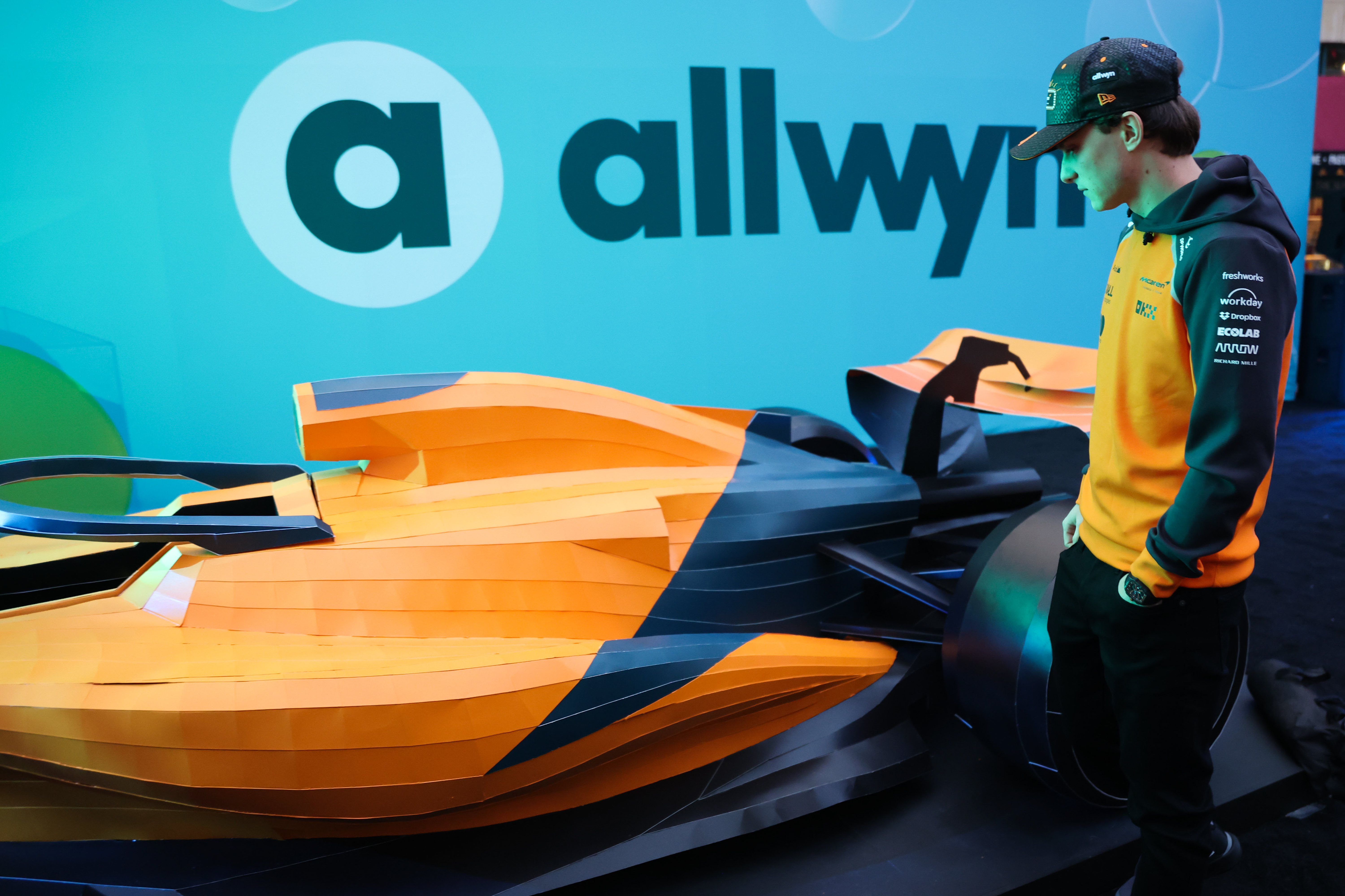 Oscar Piastri examines the 970 individual panels that reveal prizes on the Scratch Car launched by Allwyn and the McLaren F1 Team