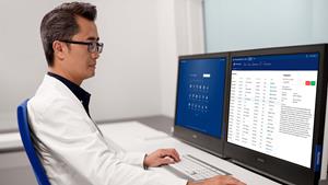 A researcher reviews patient data