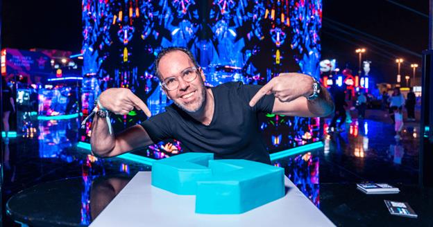 A person pointing at a blue object  AI-generated content may be incorrect.