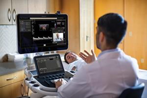Clinicians collaborating over virtual chat