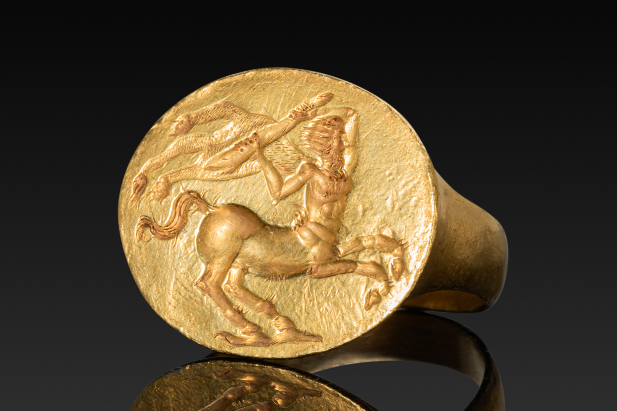 GREEK SOLID HIGH KARAT GOLD RING WITH THE CENTAUR NESSUS