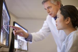 Physicians view radiology images on screen