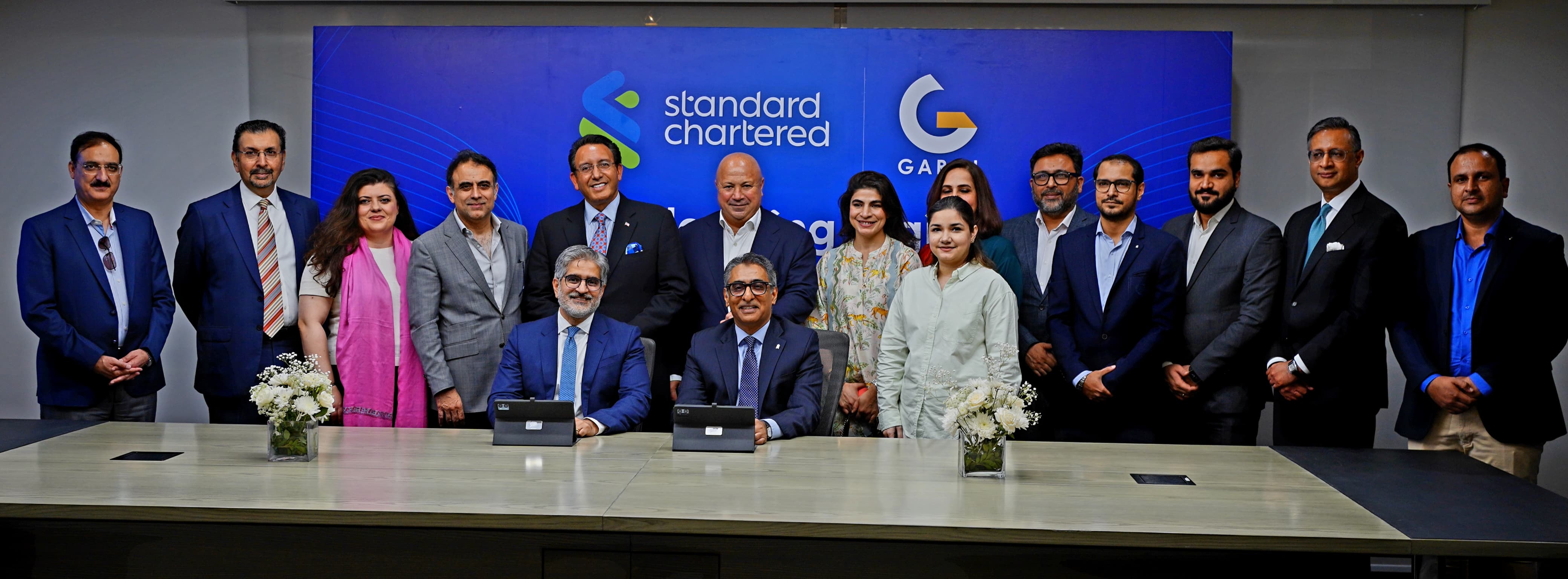 Garaj and Standard Chartered Bank signing 