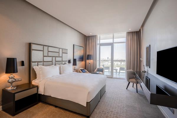 Suite bedroom at Radisson Dubai DAMAC Hills