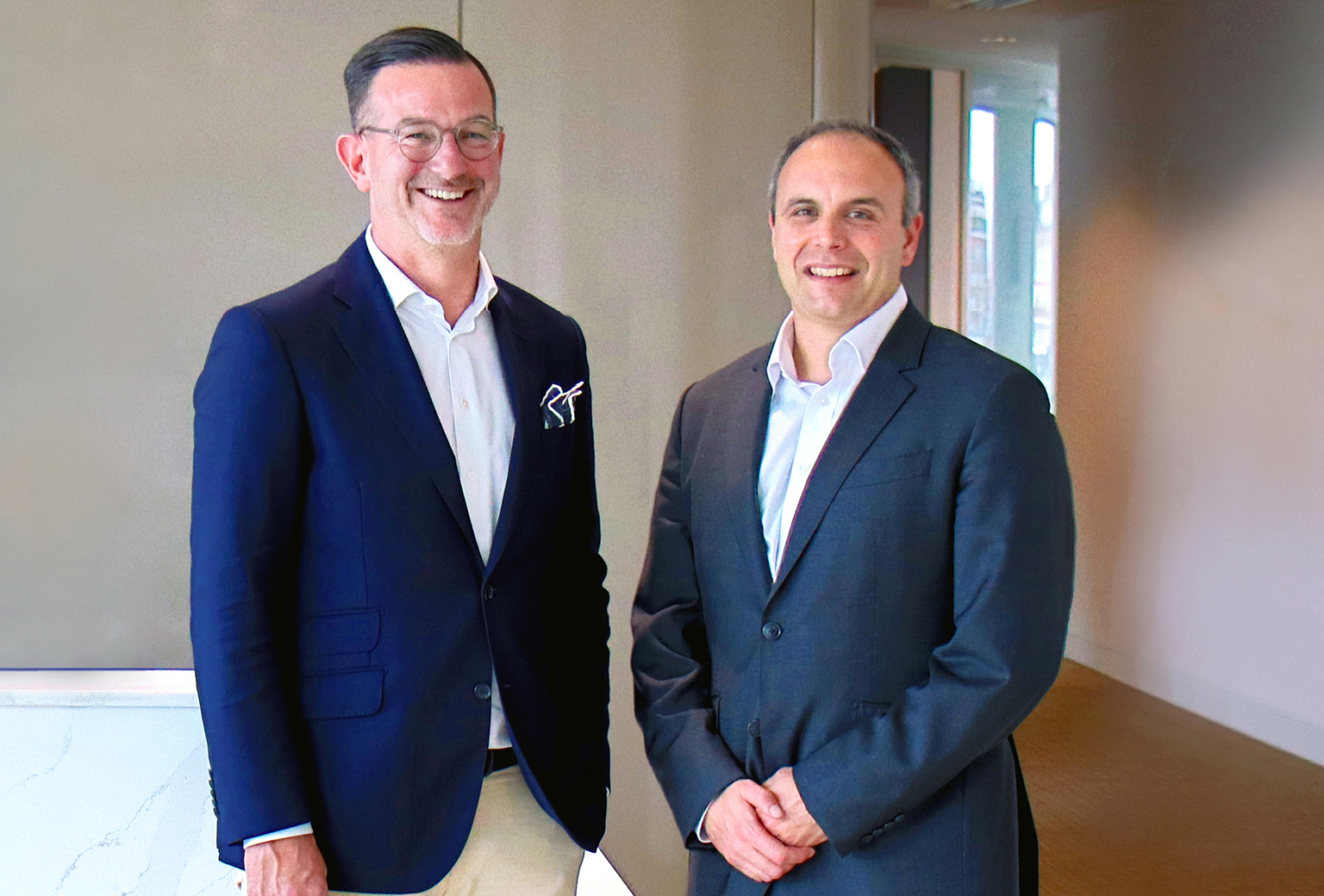 Davoud Amel-Azizpour, CEO, Colliers EMEA and Robert Hauri, CEO Intercity Group and Co-Owner & CEO SPGI Zurich AG