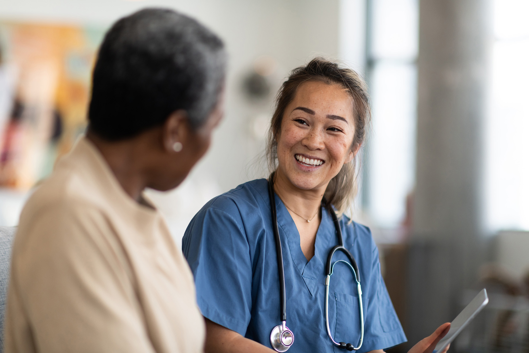 Doctor talking to patient