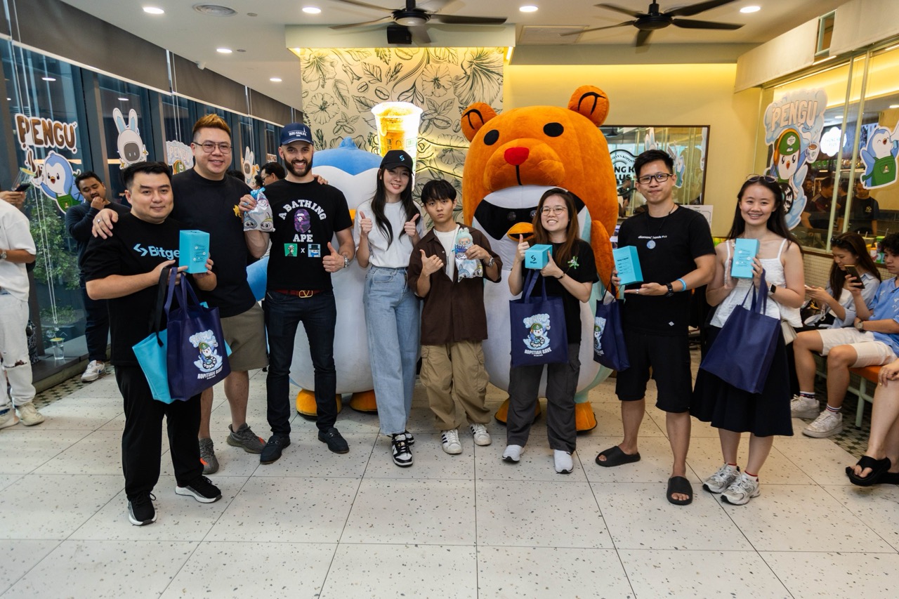 Bitget Trivia winners with their various merch including the much-coveted Bitget Labubu doll