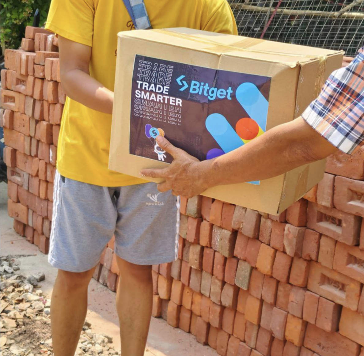 Volunteer giving out aid boxes