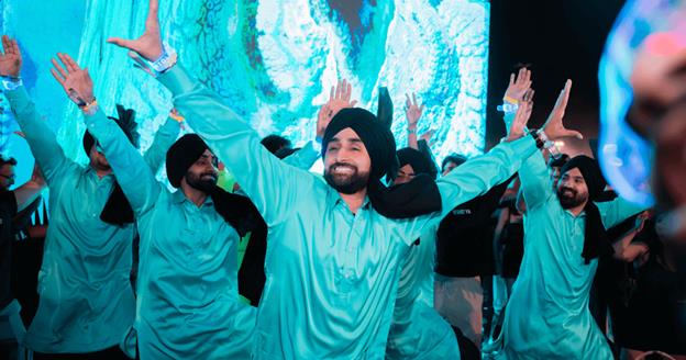 A group of people dancing  AI-generated content may be incorrect.