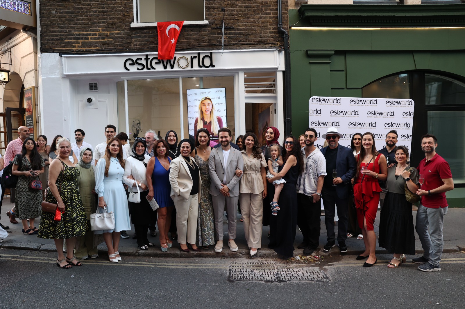 A group photo with guests attending the opening event