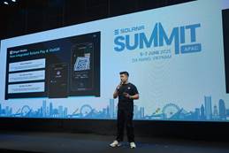 A person standing on a stage  AI-generated content may be incorrect.