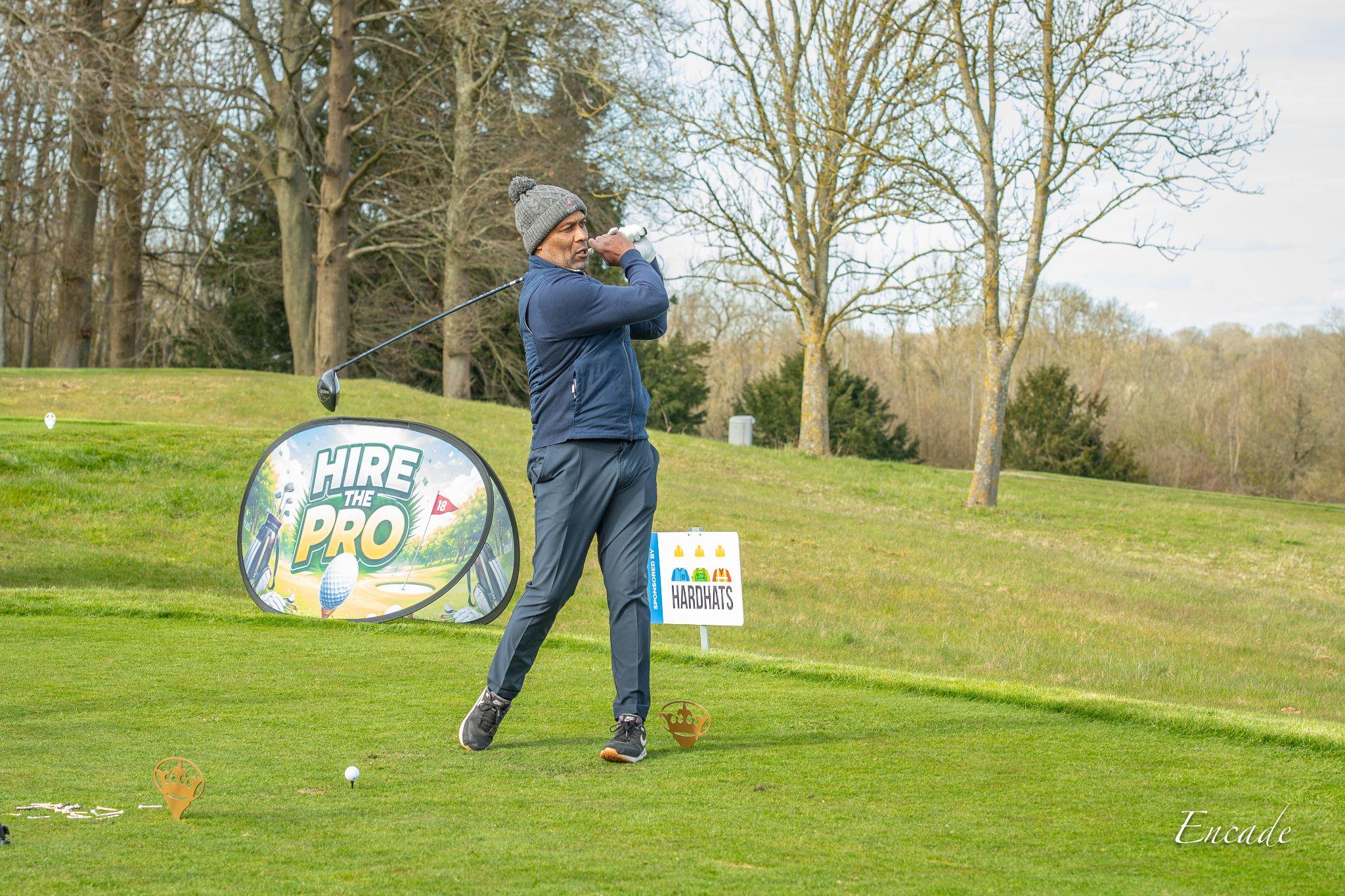 Les Ferdinand MBE takes part in the Beat the Pro challenge on the course at the London Golf Club.