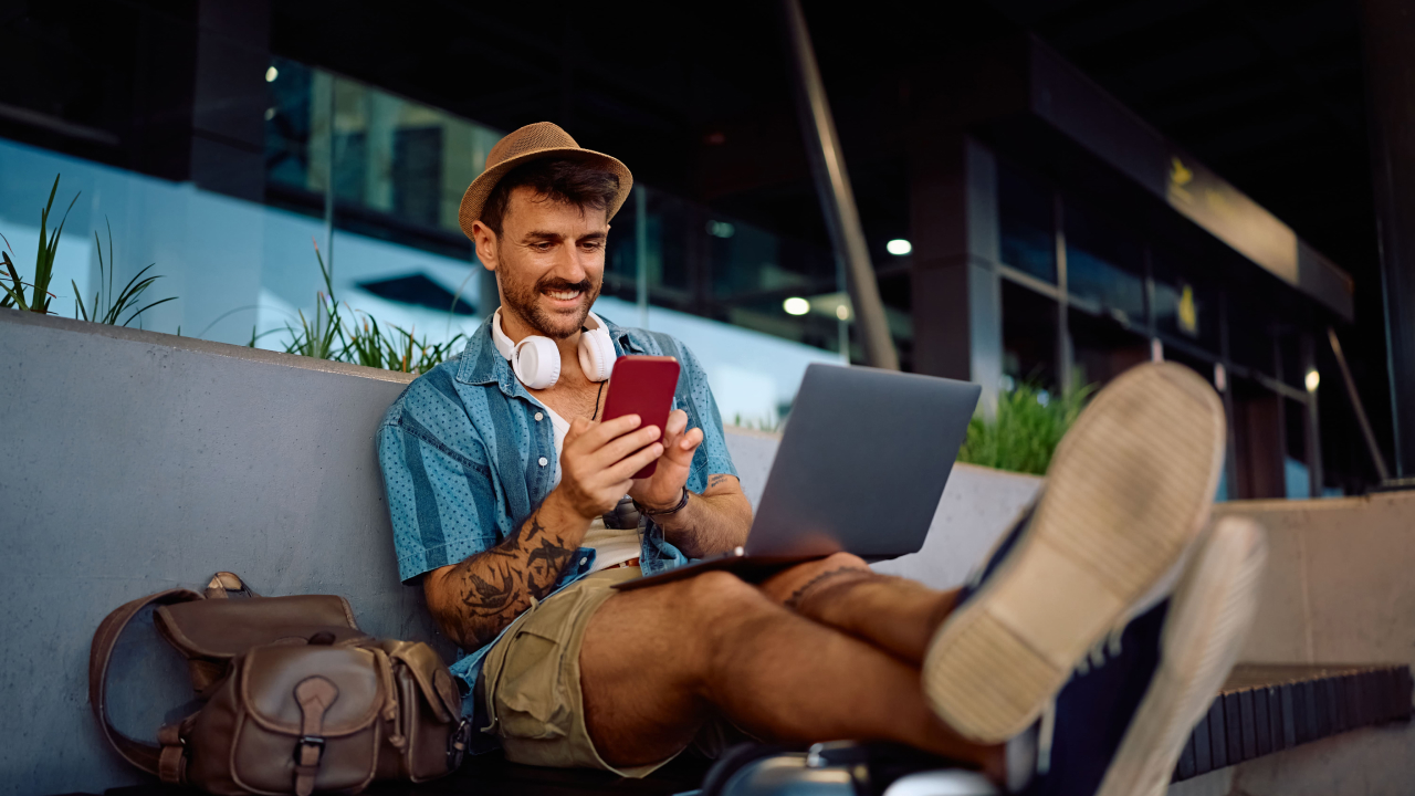 A traveler staying connected on the go. According to Holafly's Travel eSIM Value Index 2026, choosing an exact-day eSIM plan can save travelers up to 33% compared to fixed-duration packages.