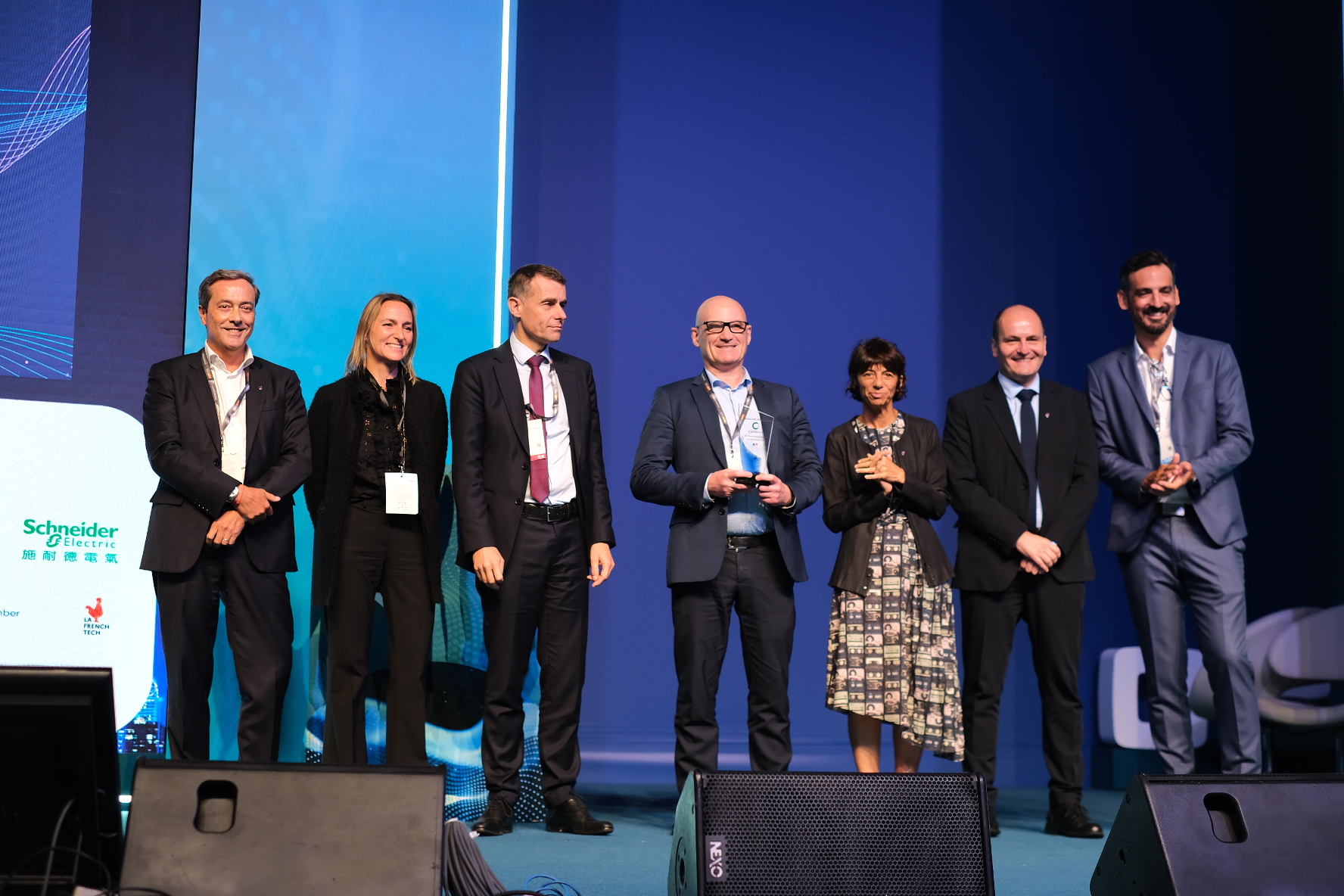 Dr. Bruno LANGLOIS, Technologies & Institutional Partnerships Director  for CARBIOS (center), receiving the « So French So Innovative » Award on behalf of CARBIOS at InnoEX 2024, Hong Kong.